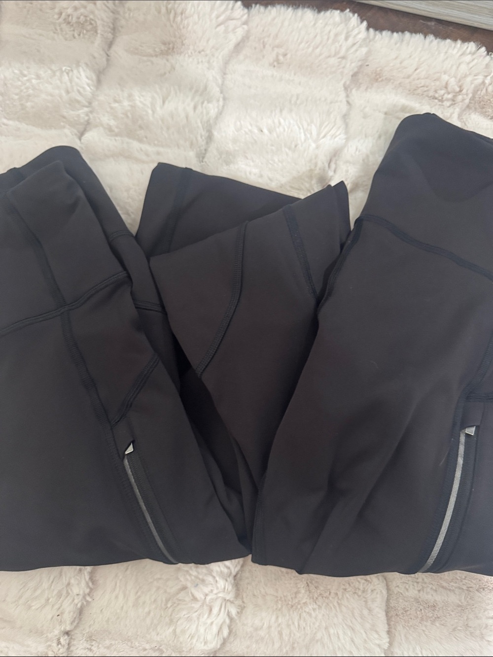 Athleta Black Performance Leggings with Zip Pocket. Two available
